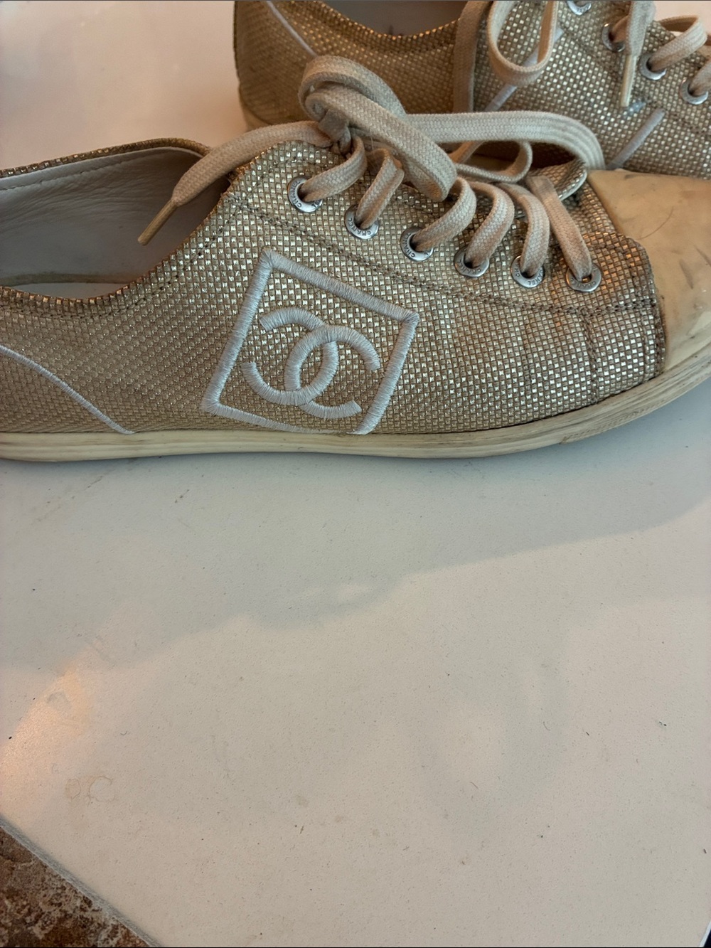 CHANEL Gold Glitter Low-Top Sneakers with White Laces